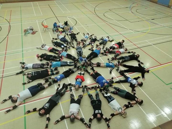 Cats making a floor snowflake